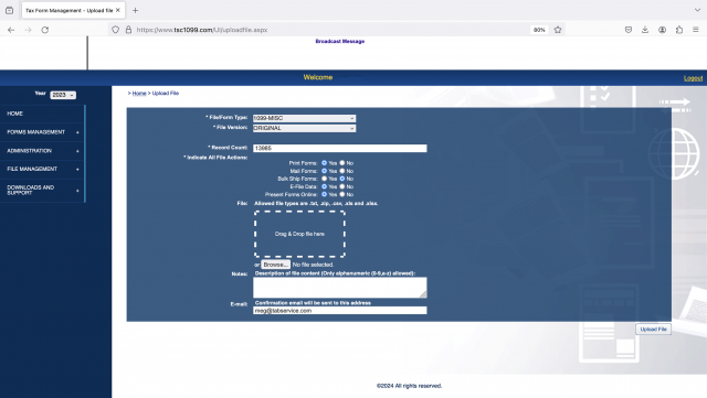 A screenshot of web-based tax app shows a page inside a browser that lets the user select file upload details and upload a data file.